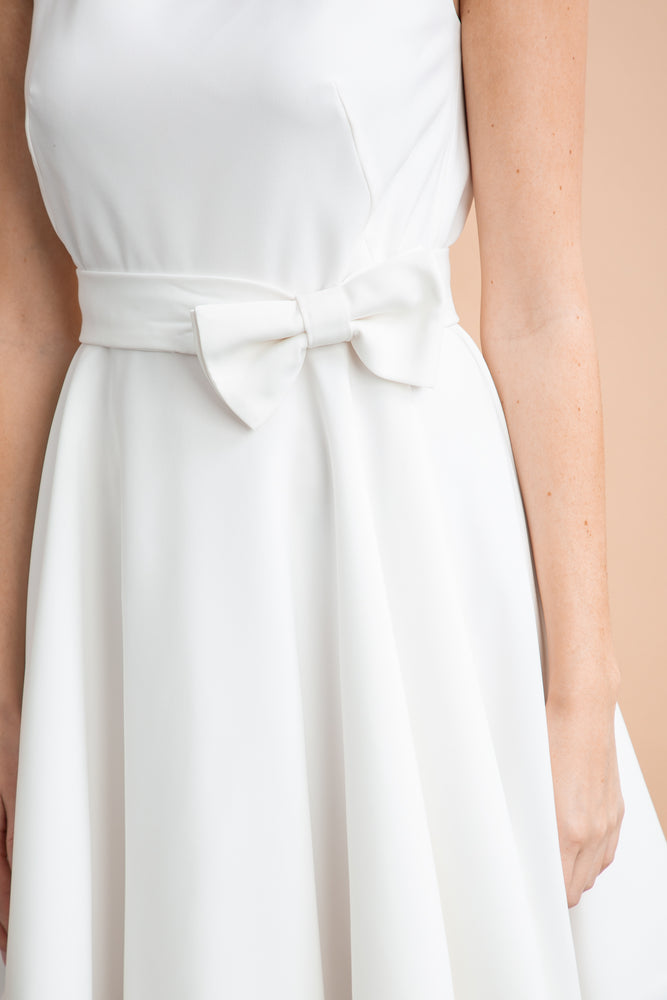 
                  
                    a white dress shirt in a white dress 
                  
                